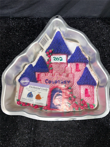 lot 202 image: Wilton Heart-Shaped Cake Pan with Decorative Frosting Design