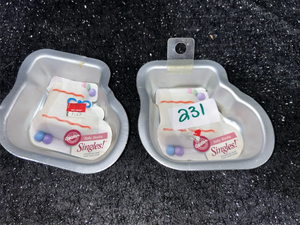 lot 231 image: Wilton Singles Baby Bootie Cake Pan Set of 2