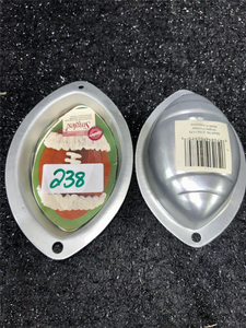 lot 238 image: Wilton Football-Shaped Cake Pan  Set of 2