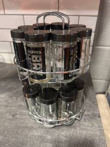 lot 309 image: Rotating Spice Rack Organizer with 12 Glass Jars and Black Lids