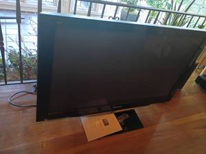 lot 1028 image: 50in. Panasonic Plasma Television with Remote.  Pretty heavy, bring help