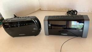 lot 1102 image: 2 Digital Alarm Clock Radios SmartSet Research and Timex