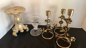 lot 1131 image: Decorative Candle stick holders 8 inches tall and smaller