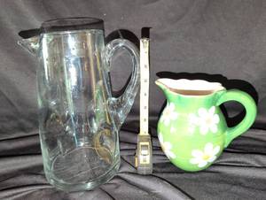 lot 1206 image: Teleflora Gift Green Ceramic Pitcher with Daisy Design and Glass Pitcher Lot