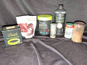 lot 1209 image: Health Supplements Lot Nutiva MCT Oil, Orgain KETO Plant Protein, Stevia, Egg Rings, Chocolate
