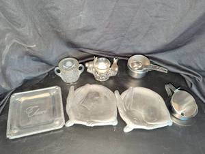 lot 1221 image: Serveware Lot Cheers Plate Rabbit Dishes Metal and glass cup, bird salt and pepper shaker.