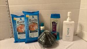 lot 1350 image: Comfort Bath Washcloth Lot with Hair Care and Body Products