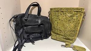lot 1434 image: Soft Black Leather Bag with Green Embossed Leather Bag