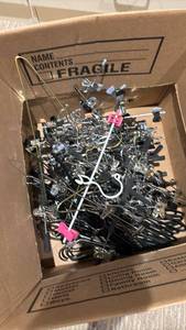lot 1439 image: Box of Metal Pant Hangers