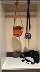 lot 1442 image: Lot of Bags and Camera Cases Orange Shoulder Bag, Wallets, Canon and Olympus Cases