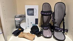 lot 1454 image: Nsight Health Blood Pressure Monitor, Walgreens Glucose Meter, Braces Wraps Size S