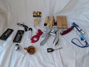 lot 2001 image: Wine and cigar Accessory Lot Corkscrews, Keychains, Stoppers, and more