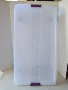 lot 2104 image: Clear Plastic Storage Container with Purple Handles and wheels 7x34x18
