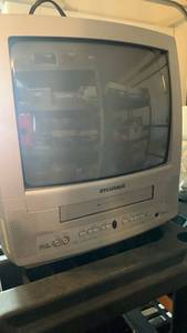 lot 2403 image: Sylvania 13 inch TV VCR Combo VHS