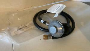 lot 2414 image: Propane Regulator with Hose and Fittings