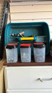lot 2509 image: Three containers of screws in a Turquoise Caddy