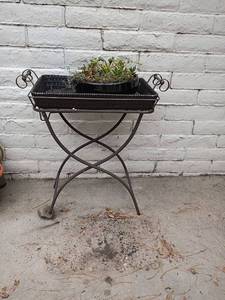 lot 3103 image: Outdoor Cart with Tray and Live Plant.  Cart has a broken leg.  Cart is 31 x 27 x 15