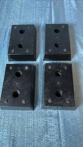 lot 2111 image: Set of 4 Black Rectangular Plastic Furniture Feet.