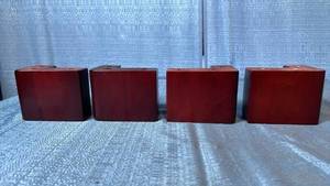 lot 2126 image: Lot of 4 Red Wooden L-Shaped Furniture Legs.