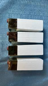 lot 2135 image: Lot of 4 White and Brass Wooden Furniture Legs.