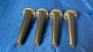 lot 2139 image: Lot of 4 Gold Plastic Furniture Legs.