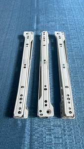 lot 8012 image: 3 Piece (Drawer) Set of White 12 Roller Style Drawer Slides