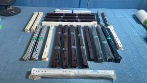 lot 8020 image: Lot of Roller Style Drawer Slides in Multiple Sizes from 10 to 18 and in Multiple Colors