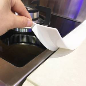 lot 2222 image: KindGa Silicone Stove Counter Gap Cover - 21 Inches Gap Filler 2 Pack White