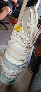 lot 34809 image: Stack of plastic 5-gallon buckets and lids