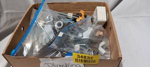 lot 34832 image: Box of various plumbing supplies
