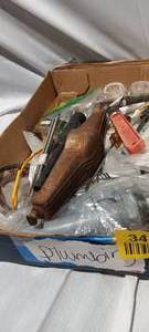 lot 34833 image: Wood handle crank, flat head screwdrivers, Metal needle files, package of wall nuts, sink stopper, stainless steel hose clamp, flooring knife