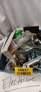 lot 34837 image: Box of metal screws, hose clamps, a variety of household home improvement items, handles, and electrical supplies