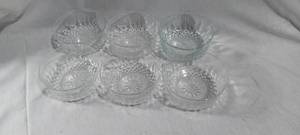 lot 34878 image: Set of 6 glass bowls with an intricate starburst and diamond cut pattern