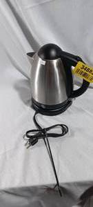 lot 34882 image: Stainless steel electric kettle with a black plastic handle, lid, and power base,