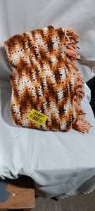 lot 34907 image: Brown, gold and cream-toned crochet blanket