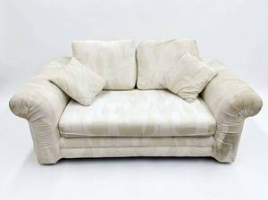 lot 3601 image: Cream Upholstered Loveseat w Pillow Back & Rolled Arms