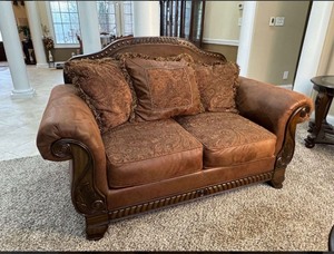 lot 3657 image: Ashley Furniture Bradington Truffle Loveseat - Retail -$1675.12 - Discounted Price - $678.58