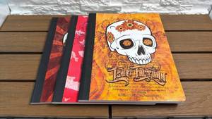 lot 7 image: T-Shirt Factory Notebooks (100 Sheets 9.75in x 7.5in 3-Pack)