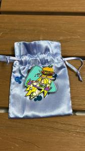lot 25 image: Disney Pixar Toy Story Buzz Lightyear Enamel Pin with Drawstring Pouch