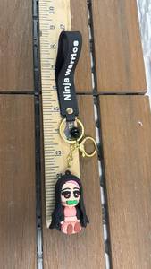 lot 45 image: Nezuko Kamado Anime Wristlet - Demon Slayer keychain with wrist strap