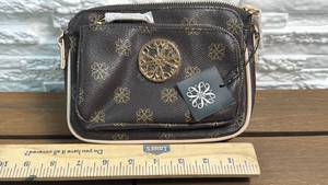 lot 54 image: Black and Gold Patterned Avon Crossbody Bag with Circular Medallion