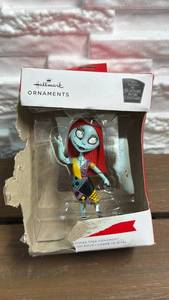 lot 86 image: Hallmark Ornaments Disney The Nightmare Before Christmas Sally Christmas Tree Ornament 3HKM0855