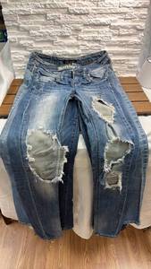 lot 95 image: Distressed Jeans - Lot of 4 in Various Sizes