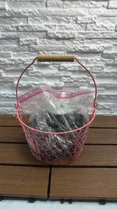 lot 216 image: Pink Wire Basket with Decorative Stones
