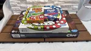 lot 219 image: Hasbro Board Game Lot Clue, Skip-Bo, Phase 10, Trouble Pop-O-Matic