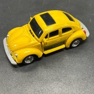 lot 23 image: Yellow Transformer style - Beetle Diecast Model Car with Opening Doors & top - for Restoration or Parts.  See all pics