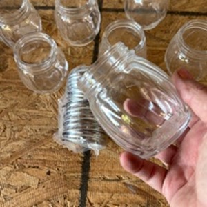 lot 75 image: (7) Glass Shakers and Lids