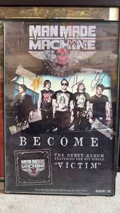 lot 127 image: Man Made Machine Become Debut Album SIGNED Poster Approximately 11 by 17 inches