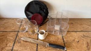 lot 156 image: Mixed Kitchen Lot Stemless Glasses Pampered Chef Knife, CondimentNapkin Holder,  Organizer Bag with Collapsible Camp Mess Kit