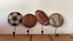 lot 165 image: Tin Sports Ball Wall Hooks 24 Inches wide